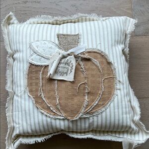 Striped Pillow with Pumpkin Design